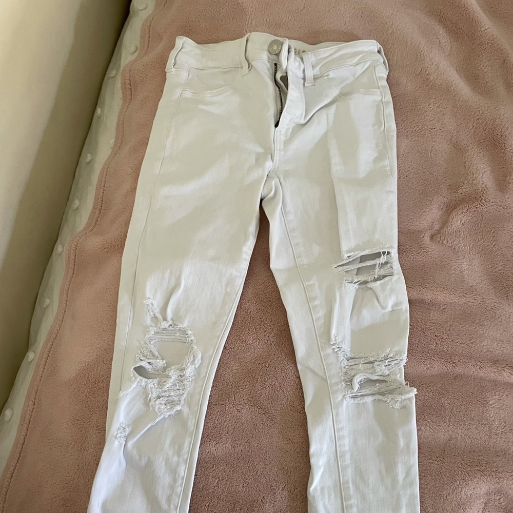 Skinny white ripped American Eagle jeans